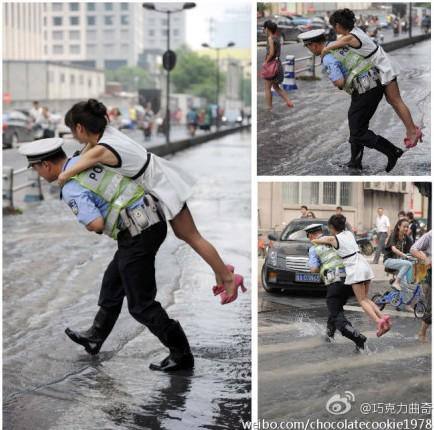 妹子求助,交警背起她过了积水路面