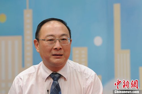 9月4日,中国人民大学国际关系学院副院长金灿荣解读中国“秋季外交”。 中新网记者 张龙云 摄