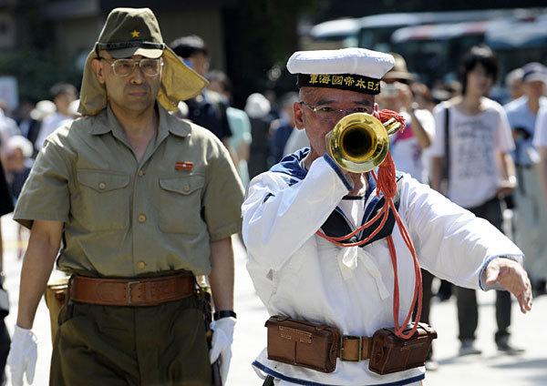 人民日报:日本不是"正常国家" 注定如此反扑