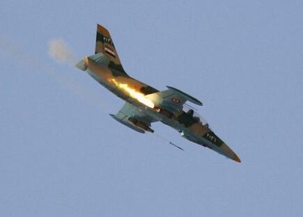 叙利亚战机越境空袭伊拉克叛军 至少50人死亡