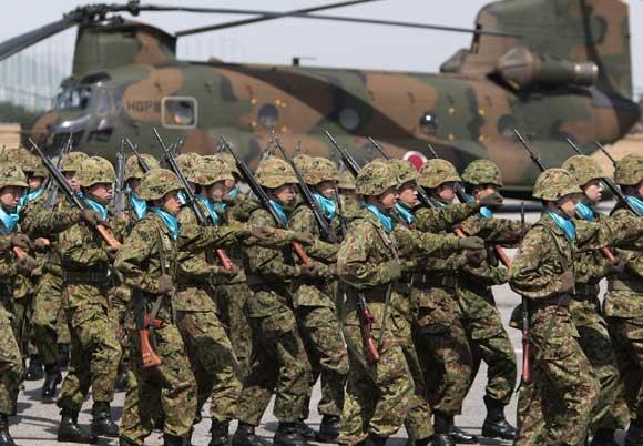 安倍失言遭穷追猛打 举白旗称再不用“我军”