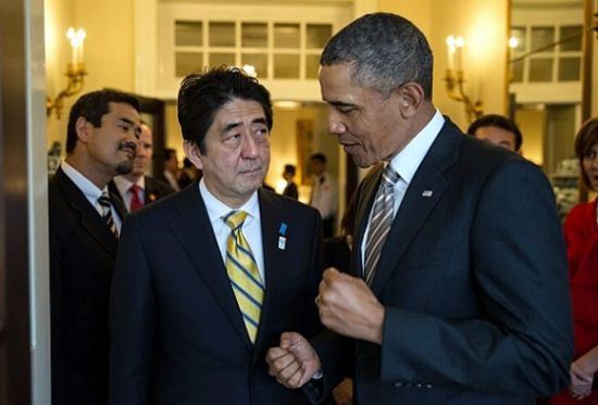 资料图:奥巴马与安倍晋三。