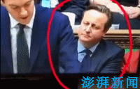 英国财长作报告 卡梅伦身后偷吃糖果被拍(图)