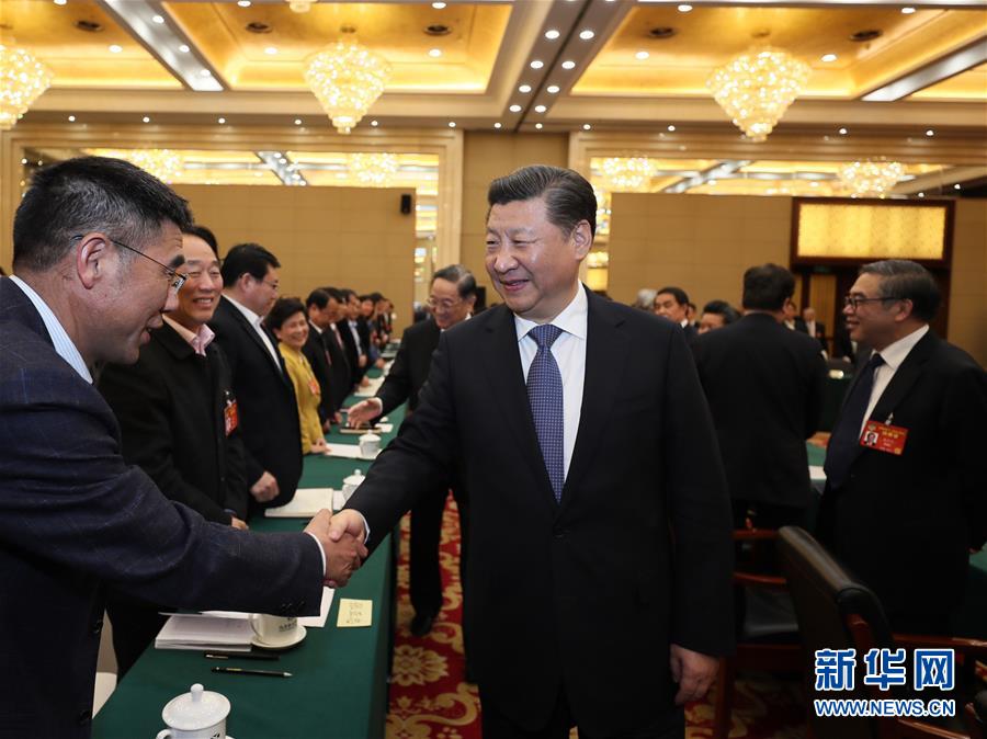 (两会)习近平看望参加政协会议的民进农工党九三学社委员