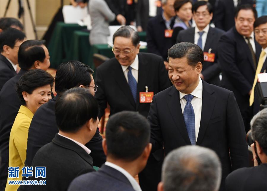 (两会·XHDW)(3)习近平看望参加政协会议的民进农工党九三学社委员