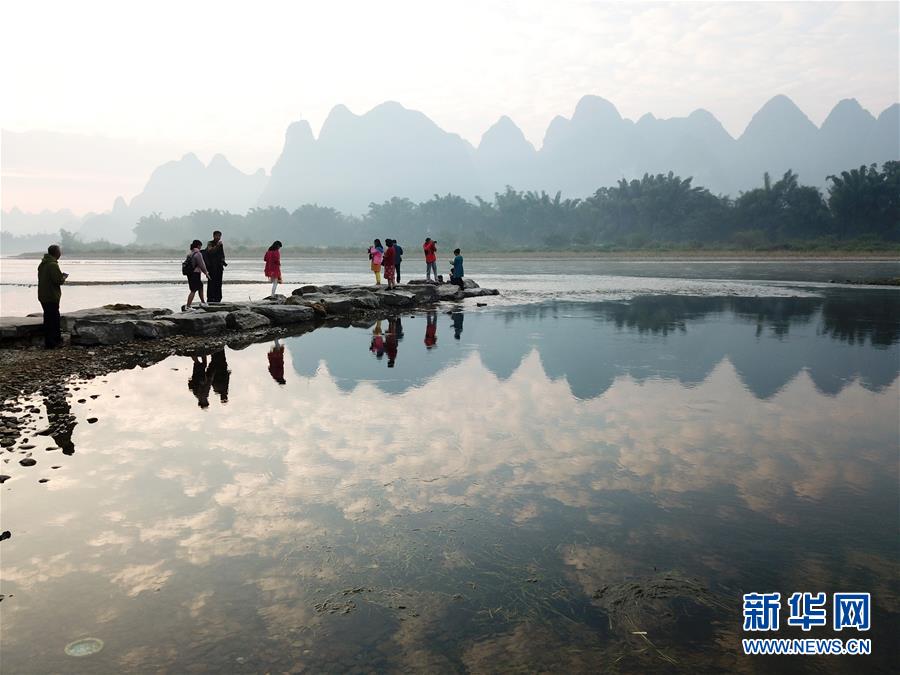 ���»�ȫýͷ����ͼ�Ļ�������13���˹����𴺳�������ϰ��ƽͬ־Ϊ���ĵĵ�������Ĺ�����չ��ʵ