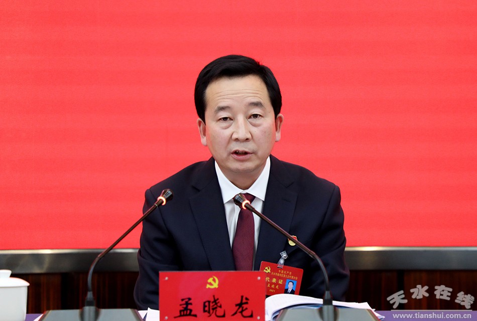 孟晓龙参加区第九次党代会第二代表团讨论(图)